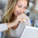 woman writing freelance articles for a paycheck